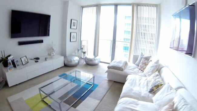 Large and bright living room with terrific access to balcony ! - 79 SW 12th St