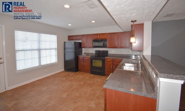 Building Photo - Wonderful 2BR/2.5BA Mboro townhome in the Villas at Evergreen Farms