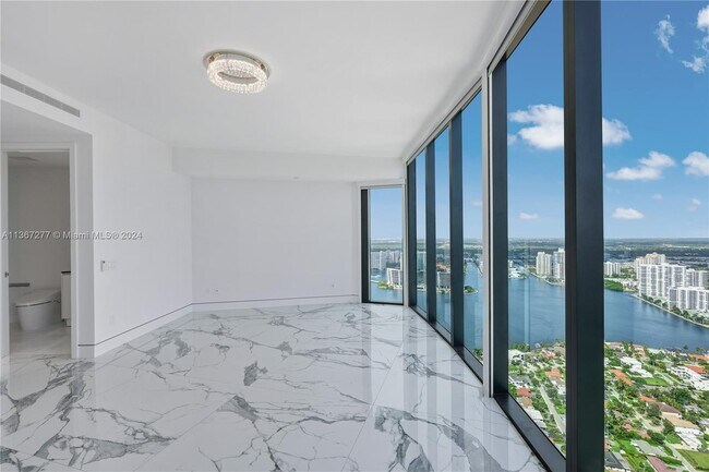 Building Photo - 18555 Collins Ave