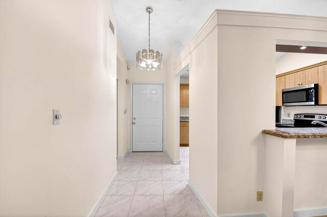 Building Photo - 10938 Roebelini Palm Ct
