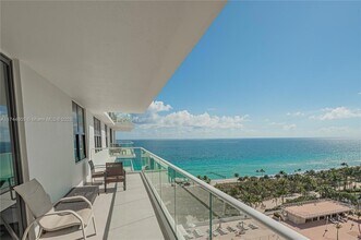 Building Photo - 9801 Collins Ave