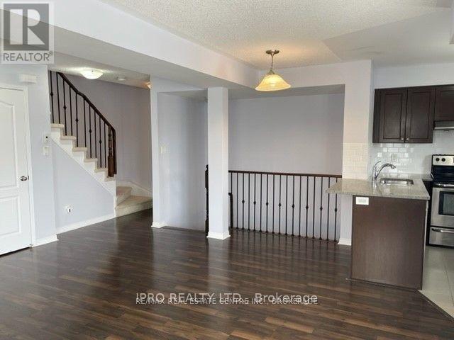 Photo du bâtiment - 5625-5625 Oscar Peterson Blvd