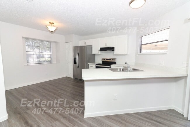 Building Photo - Summer Special! Charming 2 Bed/2 Bath Vill...