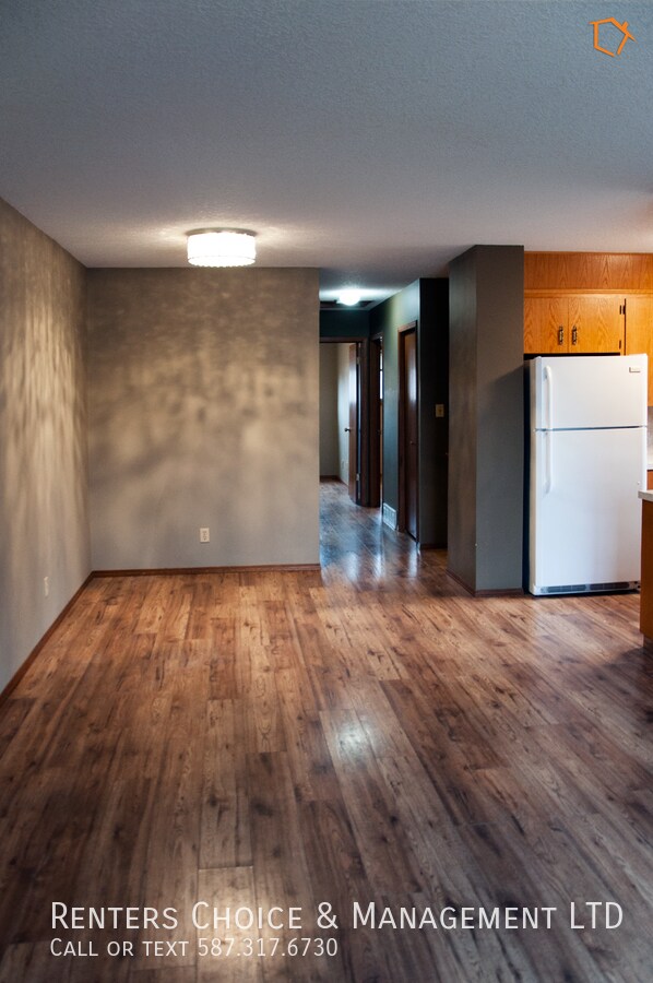 Building Photo - Quick Walk to Work or School from this North Lethbridge Half Duplex