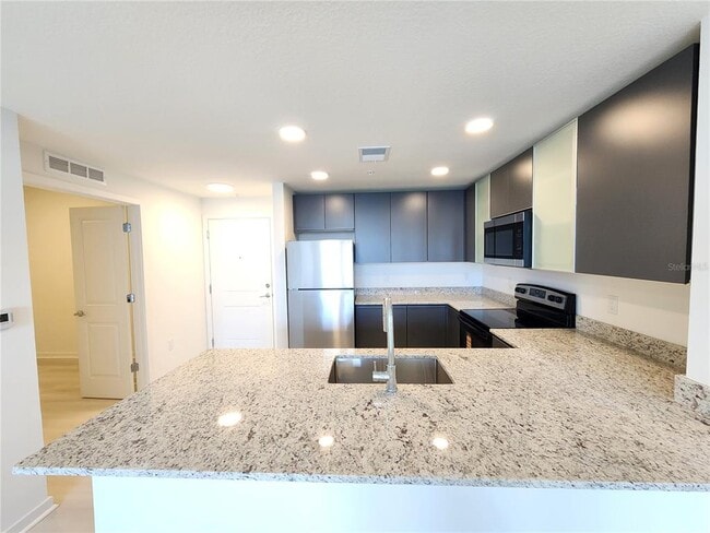 Foto del edificio - 5563 Millennia Park Dr