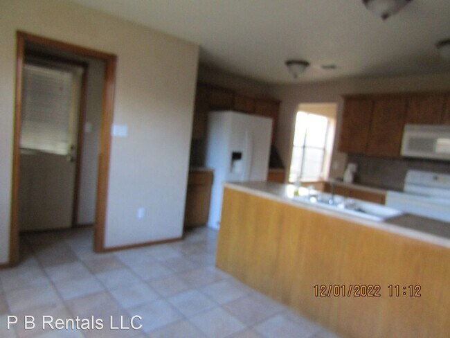 Foto del edificio - 4 br, 2.5 bath House - 3512 NE 35th St.