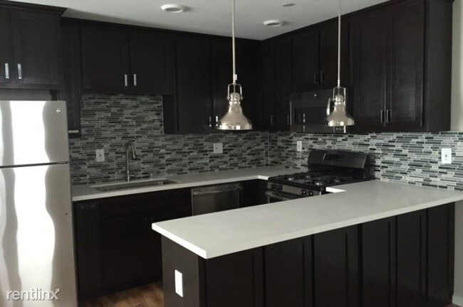 Foto del edificio - 1168 W 36th Pl