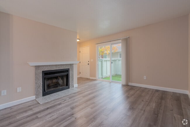 2BR, 2BA - 950SF - Living Room - El Camino Place