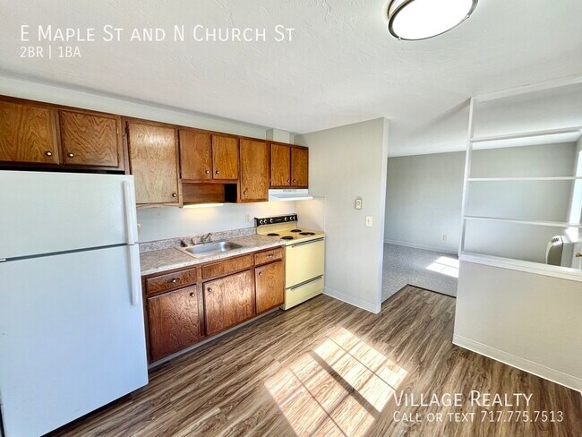 Building Photo - Brand-new flooring throughout! END-unit! A...