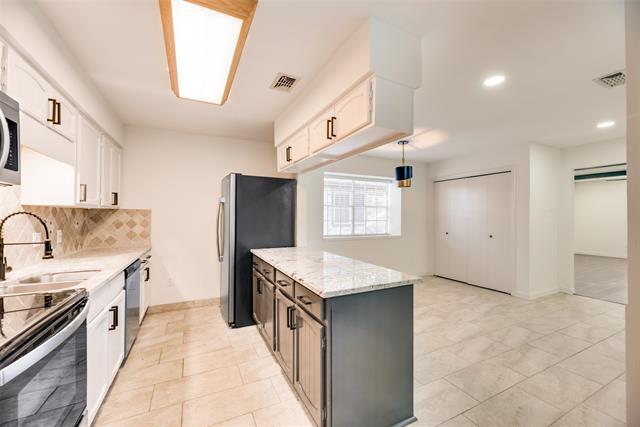 Foto del edificio - 4919 Woodland Park Blvd