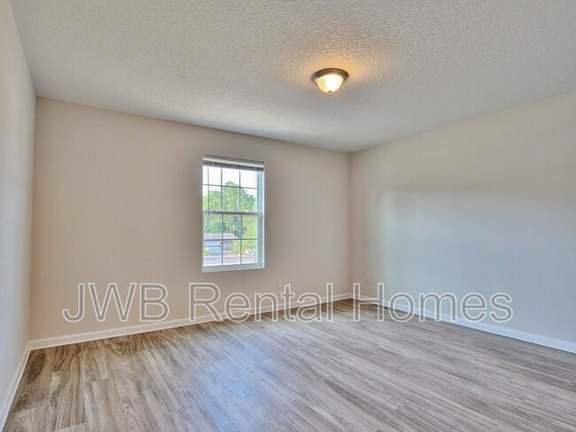 Building Photo - 8492 McGirts Village Ln