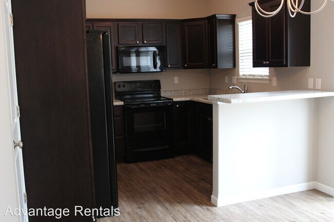 Building Photo - 4 br, 3 bath House - 1012 Manitou Trail