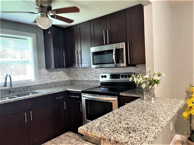 Building Photo - 5641 94th Terrace N
