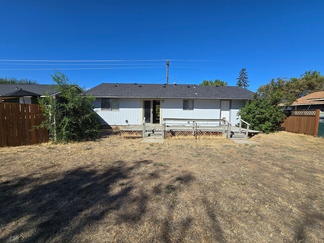 Building Photo - READY NOW. Huge backyard, lovely two bedro...
