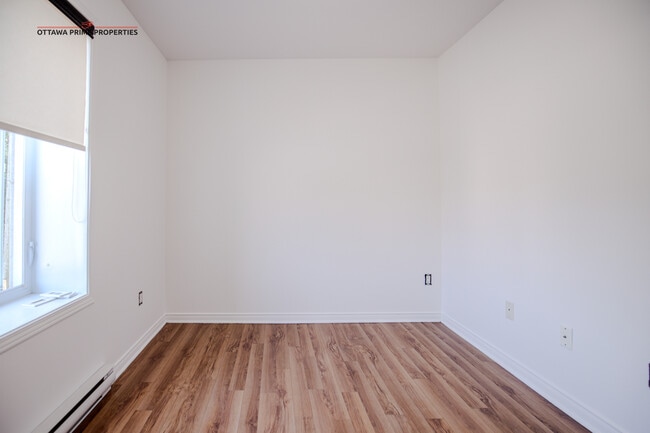 Photo du bâtiment - Modern 1-bedroom apartment near downtown Ottawa