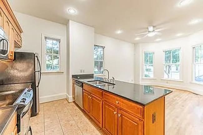 Photo - Escape to the perfect blend of comfort and convenience in the Fan! Townhome