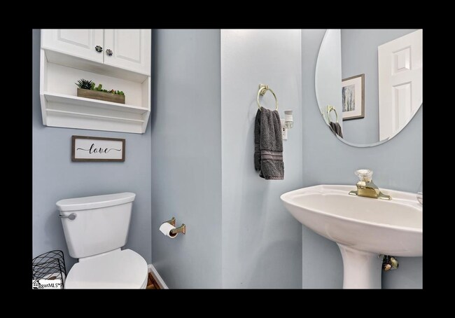 1st floor half bath - 618 Glassyrock Ct