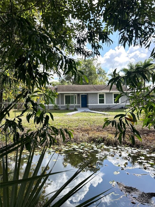 Building Photo - 6452 Royal Palm Beach Blvd