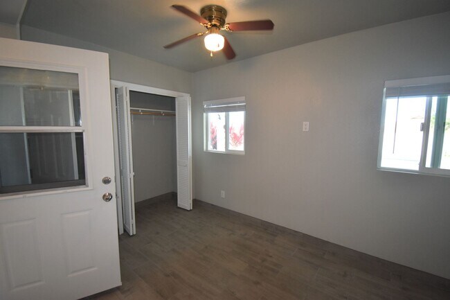 Building Photo - Studio with Private Parking, Patio, Laundr...