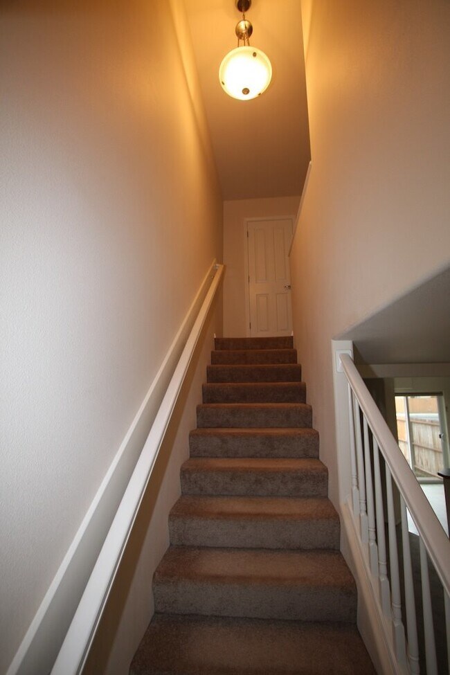Building Photo - 3 Bedroom East Anchorage Condo w/ Fenced Yard!