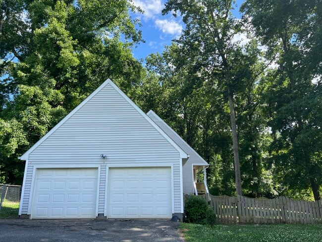 2 car garage with a covered walkway into the house - 1820 Anthony Dr