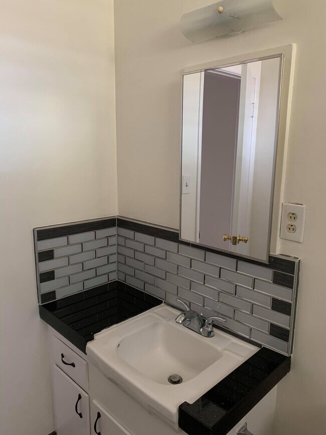 bathroom sink, new tiles - 1352 N Citrus Ave