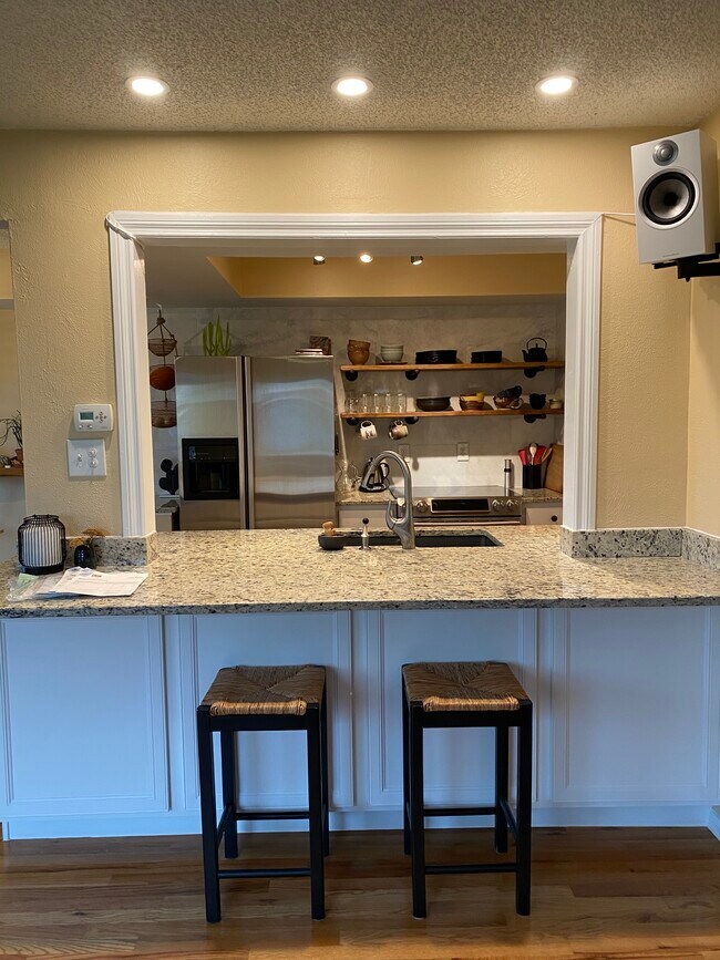 view from entering front door, bar stools - 4289 Monroe Dr