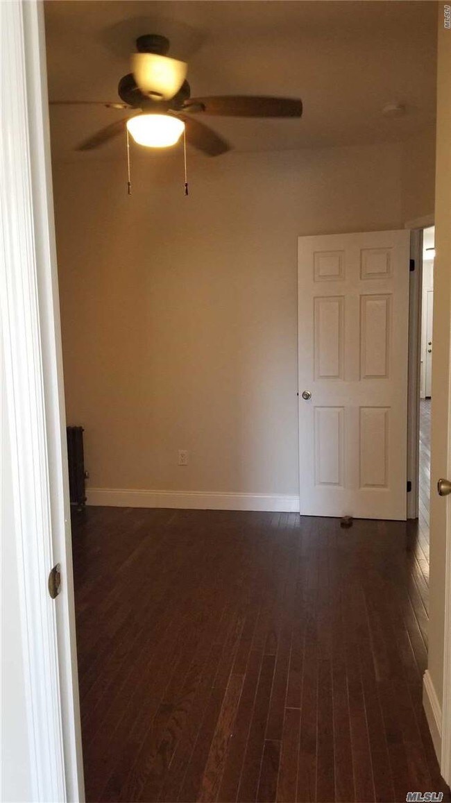 Building Photo - 75-12 64th Pl