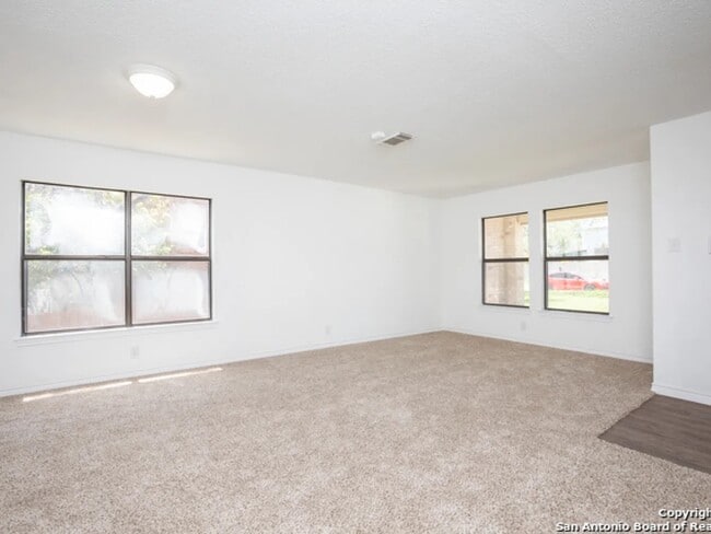 Building Photo - 8406 Point Quail