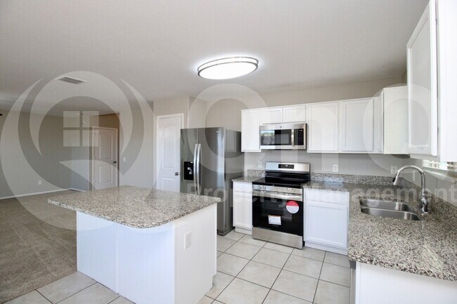 Building Photo - 5818 E Oasis Blvd