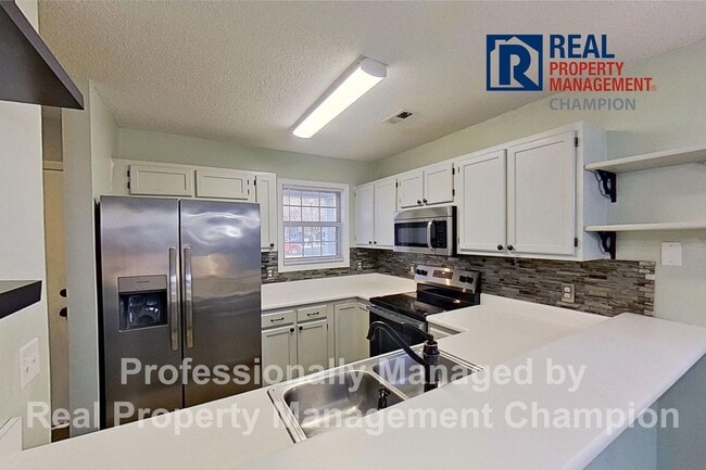 Photo - Recently updated 2 BD/1.5 BA End Unit Townhome w/Community Pool