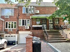 Building Photo - 66-61 73rd Pl