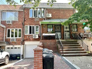 Building Photo - 66-61 73rd Pl
