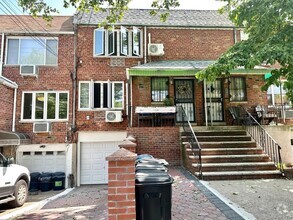Building Photo - 66-61 73rd Pl