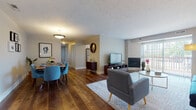Located at 9250 Shady Lake Dr in Streetsboro, Ohio, this single-floor residence offers a thoughtfully designed layout that balances comfort and functionality. Rich hardwood flooring flows throughout the main living areas, anchoring an open-concept arrangement that connects the living room, dining area, and kitchen seamlessly.

The living room is a welcoming centerpiece, featuring a fireplace, large sliding glass doors that invite abundant natural light and provide direct outdoor access, and ample space for comfortable seating arrangements. Adjacent to the living room, the dedicated dining area accommodates a full-sized table and benefits from its own overhead lighting and wall space for décor.

The kitchen is well-equipped with white cabinetry, granite countertops, a tile backsplash, and stainless steel appliances, including a dishwasher. A window above the sink brings in natural light, and a cozy breakfast nook offers additional casual dining space.

The unit includes two carpeted bedrooms, each with windows that frame outdoor greenery and provide a calm, restful atmosphere. The bathrooms feature hardwood-style flooring, granite vanity tops, and a soaking tub in the primary bath. Additional hallway space offers practical storage and connects the private quarters to the rest of the home efficiently.