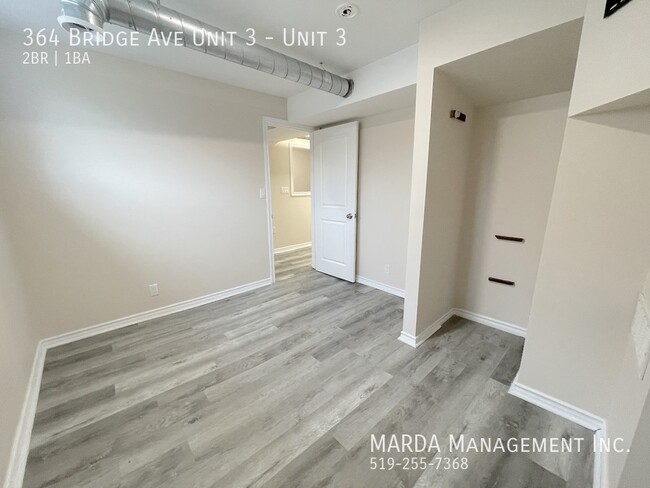 Building Photo - UPDATED 2-BEDROOM/1-BATH MAIN FLOOR UNIT-I...