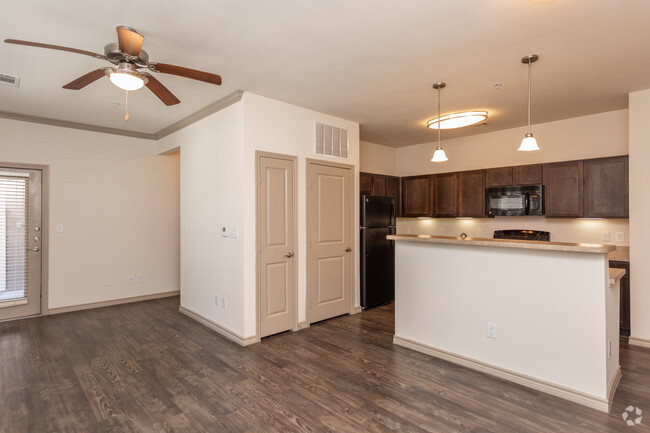 1BR, 1BA - 687SF "THE HORSESHOE" Kitchen & Living Room - Latigo Crossing