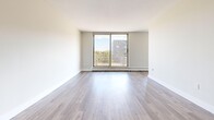 Located at 1134 Adelaide St N in London, Ontario, this one-bedroom, one-bathroom unit offers a functional and well-designed floor plan with a clean, modern aesthetic throughout. Light-toned laminate flooring runs continuously across the living spaces, lending a cohesive and bright feel to the interior.

The entrance leads into a thoughtfully arranged layout that separates the living and sleeping areas. The galley-style kitchen features white cabinetry, dark countertops, a subway tile backsplash, stainless steel appliances, and a double sink — offering both style and practicality. Adjacent to the kitchen is a dedicated dining area, which flows naturally into the spacious living room. A large sliding glass door in the living room fills the space with natural light and provides direct access to a private balcony with outdoor views.

The generously sized primary bedroom includes a closet and is bathed in natural light from a large window. Three closets are distributed throughout the unit, providing ample storage. The bathroom is finished with classic white subway tile surrounding a full soaker tub, complemented by chrome fixtures for a clean, timeless look.

With a neutral colour palette, updated finishes, and a practical room arrangement, this unit delivers a comfortable and move-in-ready living space.