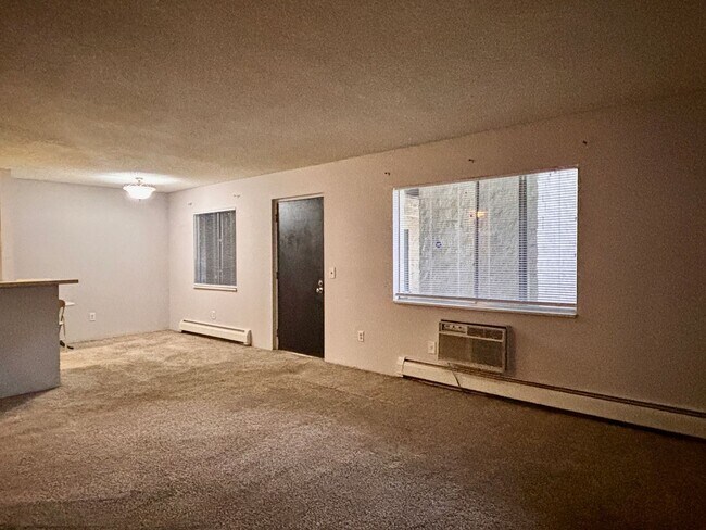 Building Photo - Spacious 2-Bedroom Condo in Denver's Monaco Lakes Community | $1,295/mo
