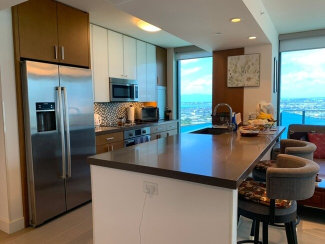 Building Photo - Fully Furnished 2B+office/2 BA/2 Parking on High Floor Corner Unit with Ocean View