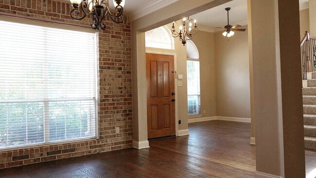 Building Photo - "Beautiful 4-Bedroom Home with Elegant Fin...
