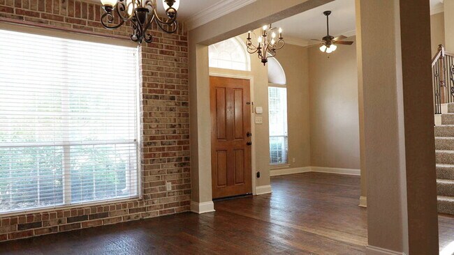 Foto del edificio - "Beautiful 4-Bedroom Home with Elegant Fin...