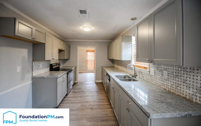 Foto del edificio - 411 Plum Point Pl
