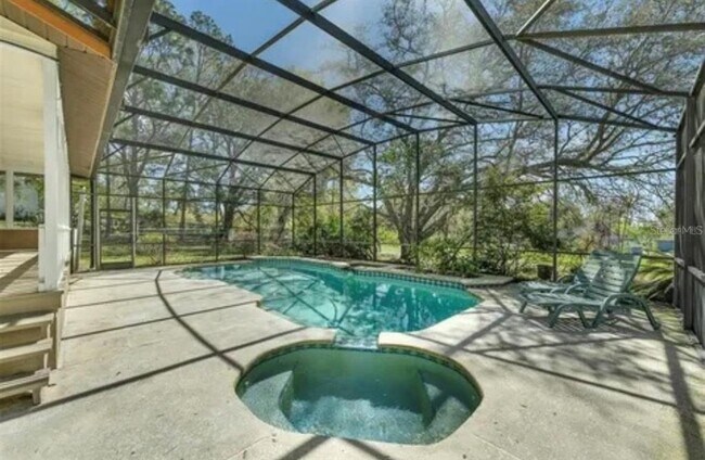 Foto del edificio - 9332 Windy Ridge Rd