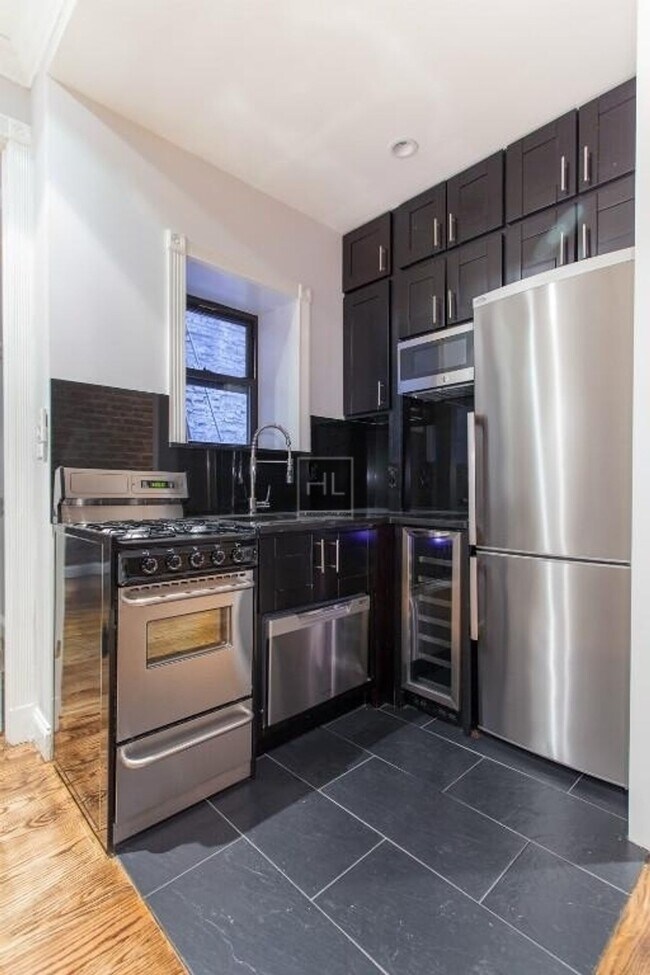 Building Photo - NO FEE LeRoy Street & Seventh Avenue 1BR • W/D • Fireplace • Wine Cooler • Pets OK