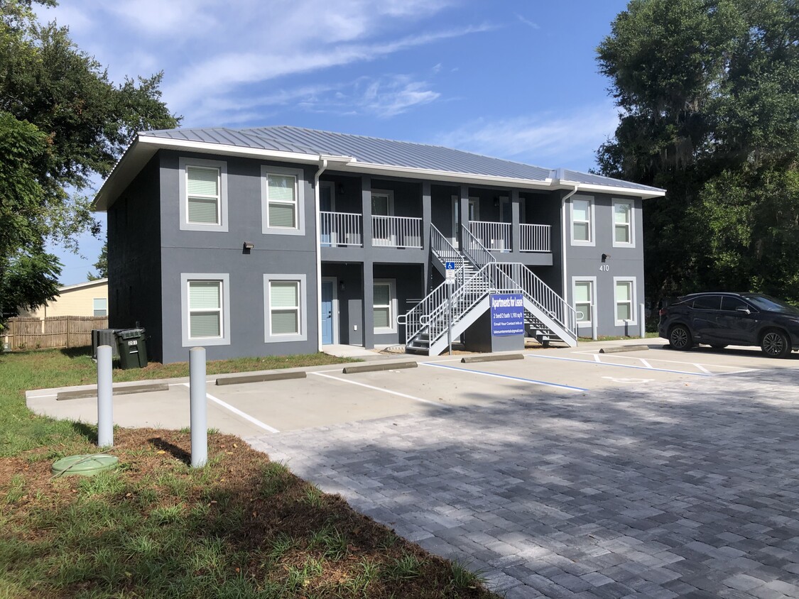 front of building. 2 free parking spaces per unit - 410 N West St
