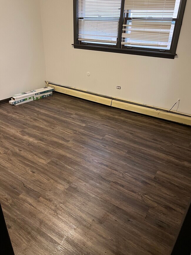 new flooring in bedroom 2 with large closet - 8054 W 95th St