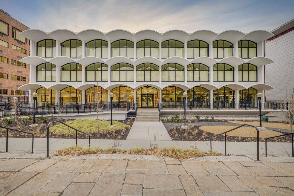 Repeating white concrete arches on the preserved former IBM building at The Source on South Temple