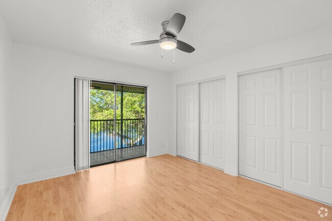 3 habitaciones, 2 baños - 1054 pies cuadrados - Dormitorio principal - The Island Club At Coral Springs