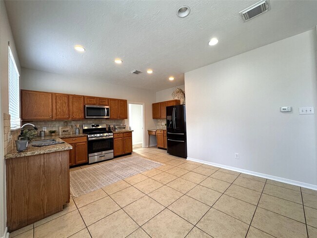 Foto del edificio - 23906 Kingmont Knoll Ct